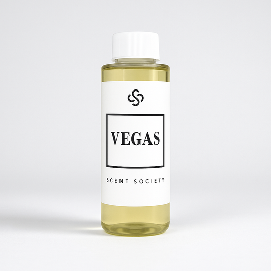Scent Society diffuser fragrance oil in clear 100ml bottle labeled Vegas, with white cap on neutral background.