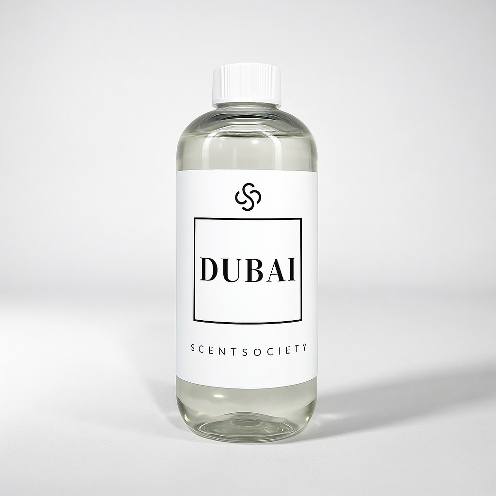 Scent Society diffuser fragrance oil in clear 500ml bottle labeled Dubai, with white cap on neutral background.