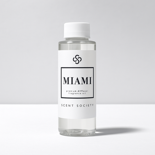Scent Society diffuser fragrance oil in clear 100ml bottle labeled Miami, with white cap on neutral background.
