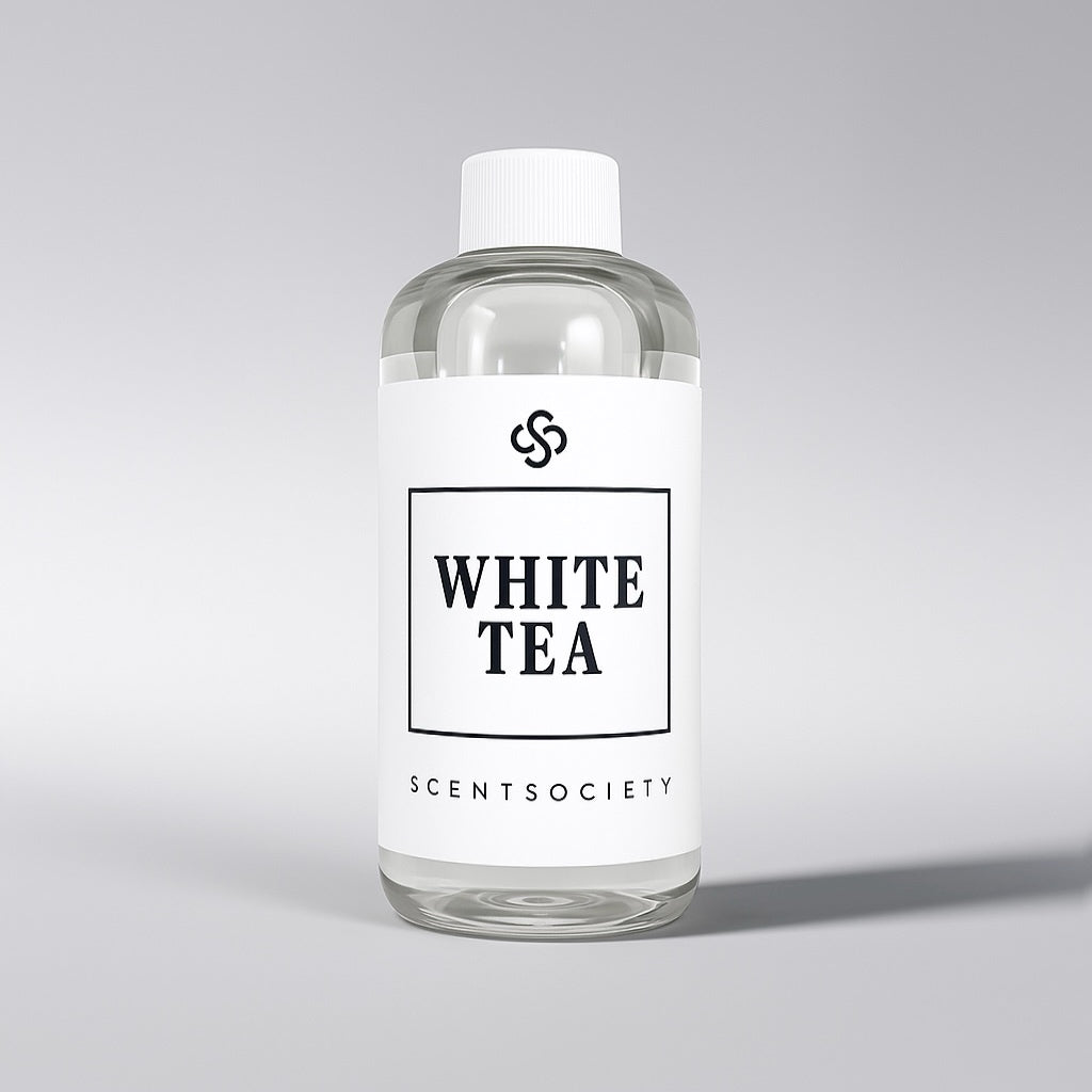 Scent Society diffuser fragrance oil in clear 500ml bottle labeled White Tea, with white cap on neutral background.