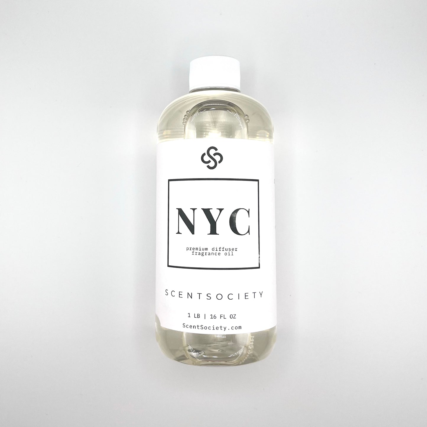 Scent Society diffuser fragrance oil in clear 500ml bottle labeled NYC, with white cap on neutral background.