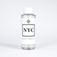 Scent Society diffuser fragrance oil in clear 100ml bottle labeled NYC, with white cap on neutral background.
