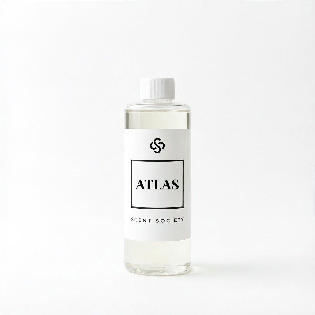 Scent Society Atlas diffuser oil bottle with clear glass, minimalist label, and white background