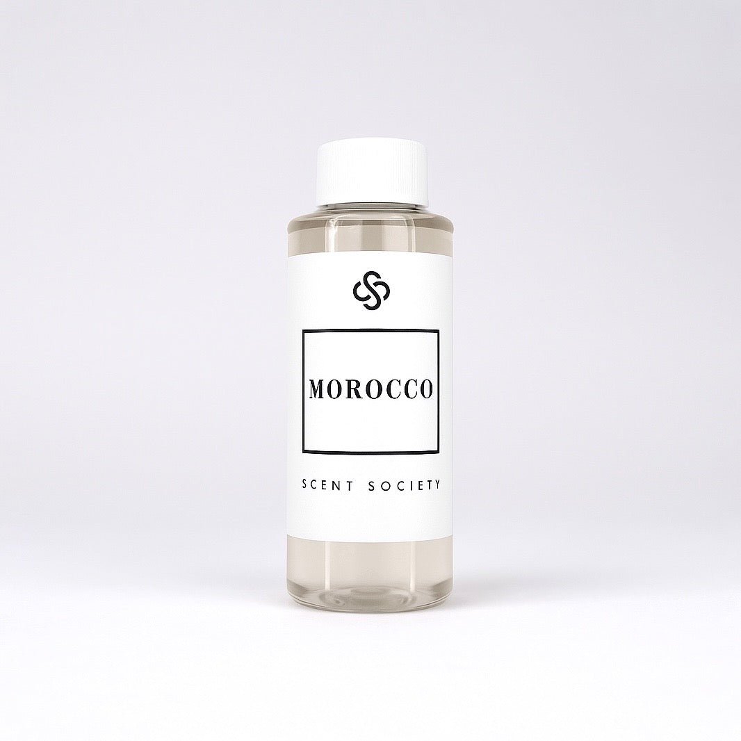 Scent Society diffuser fragrance oil in clear 100ml bottle labeled Morocco, with white cap on neutral background.