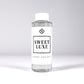Scent Society diffuser fragrance oil in clear 100ml bottle labeled Sweet Luxe, with white cap on neutral background.