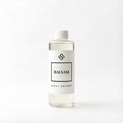 Scent Society Balsam diffuser oil bottle with clear glass, minimalist label, and white background
