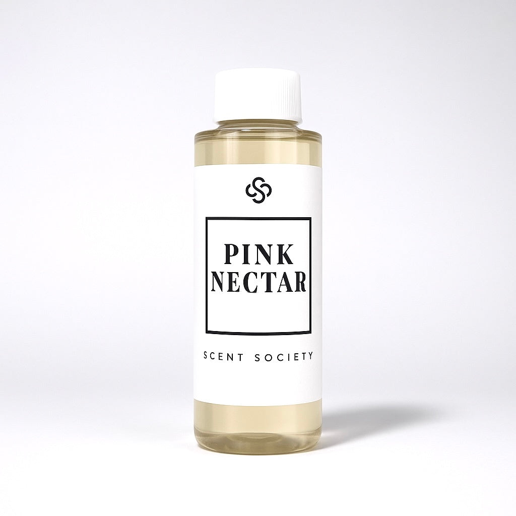 Scent Society diffuser fragrance oil in clear 100ml bottle labeled Pink Nectar, with white cap on neutral background.