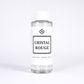 Clear plastic diffuser oil bottle with 'Cristal Rouge' Scent Society label on a white background