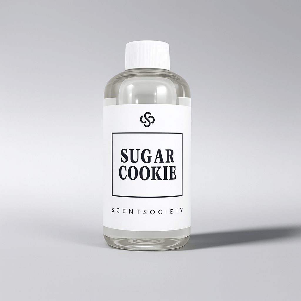 Clear bottle of 'Sugar Cookie' diffuser oil by Scent Society on a gray background