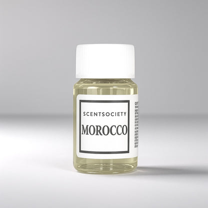 20ml bottle of Scent Society labeled 'MOROCCO' diffuser oil on a neutral background. Clear plastic bottle with white cap and minimalist black-and-white label, filled with fragrance oil. Aromatherapy oil for use in cold air diffusers.