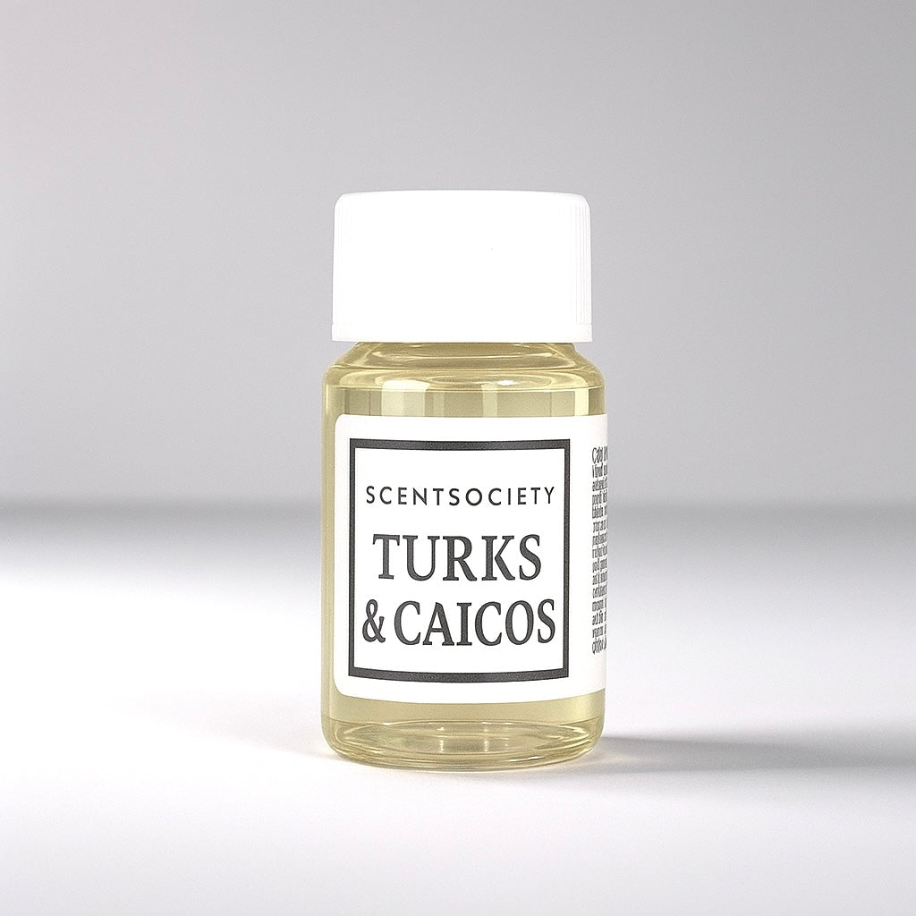 20ml bottle of Scent Society labeled 'TURKS & CAICOS' diffuser oil on a neutral background. Clear plastic bottle with white cap and minimalist black-and-white label, filled with fragrance oil. Aromatherapy oil for use in cold air diffusers.