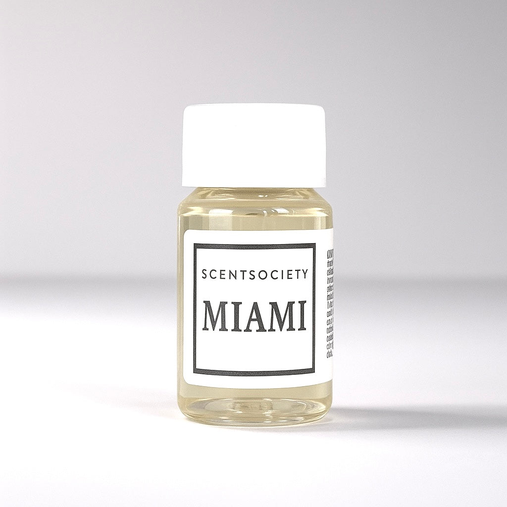 20ml bottle of Scent Society labeled 'MIAMI' diffuser oil on a neutral background. Clear plastic bottle with white cap and minimalist black-and-white label, filled with fragrance oil. Aromatherapy oil for use in cold air diffusers.