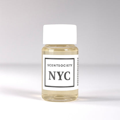 20ml bottle of Scent Society labeled 'NYC' diffuser oil on a neutral background. Clear plastic bottle with white cap and minimalist black-and-white label, filled with fragrance oil. Aromatherapy oil for use in cold air diffusers.