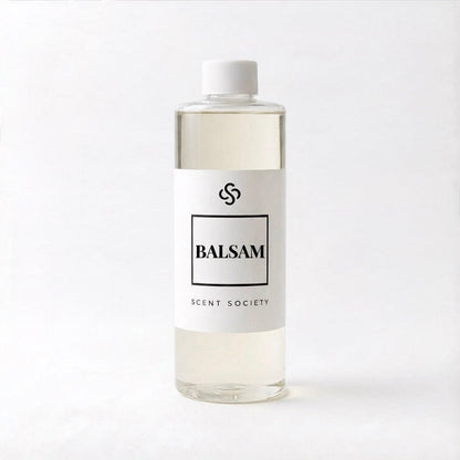 Scent Society Balsam diffuser oil bottle with clear glass, minimalist label, and white background