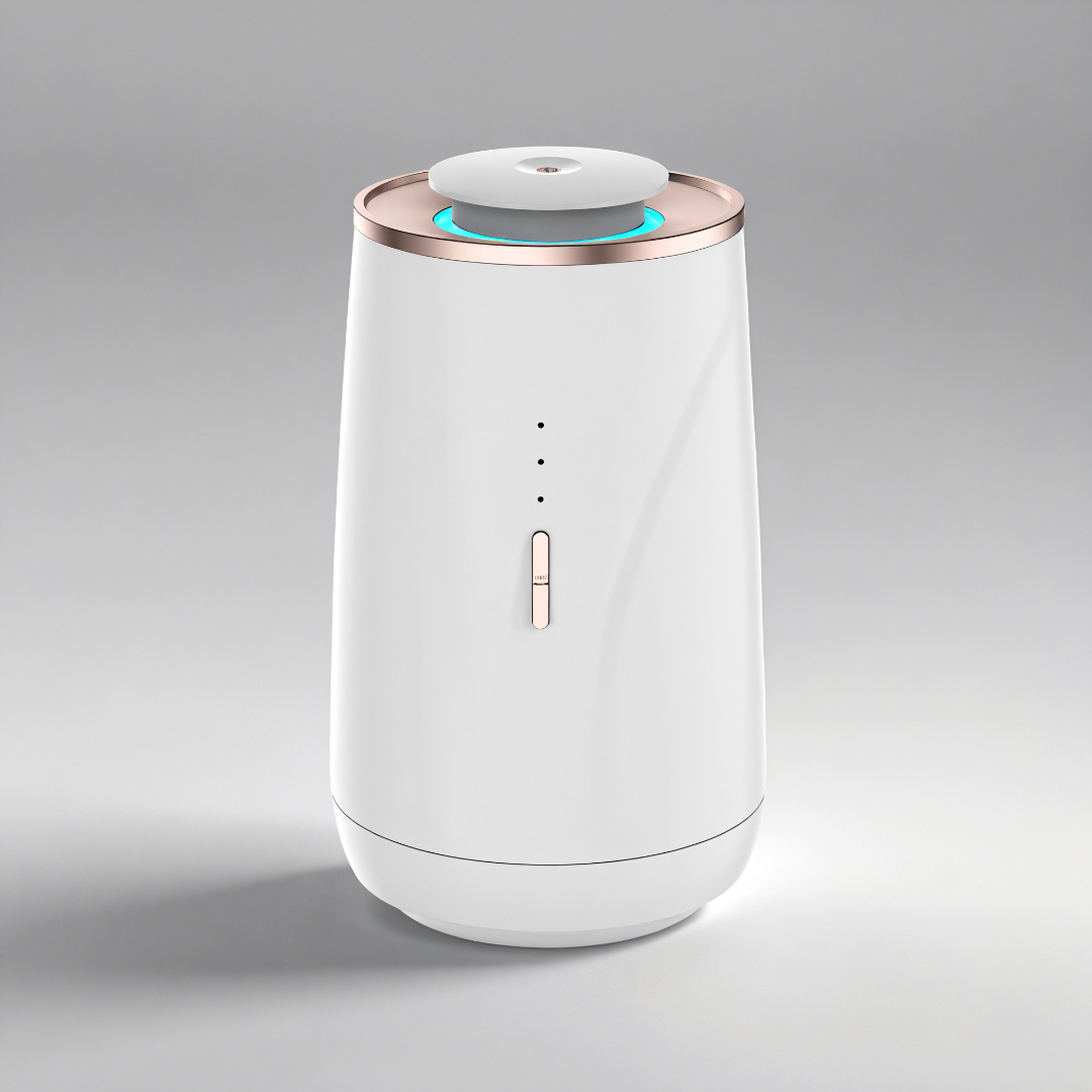 Scent Society Valet portable white car diffuser with rose gold trim, ED indicator lights, and a top-mounted mist outlet, shown on a neutral gray background.