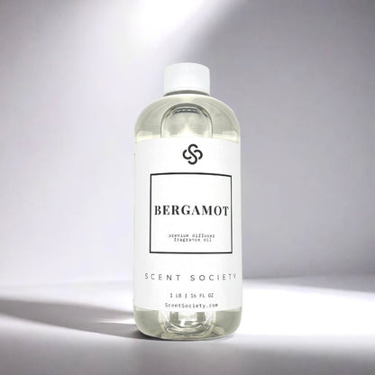 Scent Society diffuser fragrance oil in clear 500ml bottle labeled Bergamot, with white cap on neutral background.