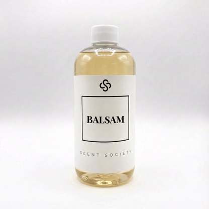 Scent Society Balsam diffuser oil bottle with clear glass, minimalist label, and white background
