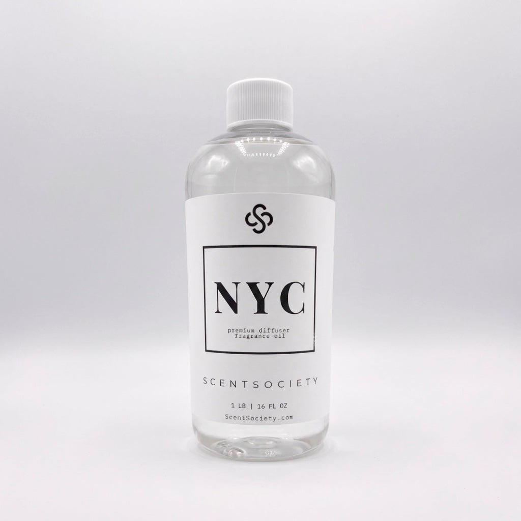 Scent Society NYC fragrance diffuser oil , 1 lb clear bottle with white label. Product image on neutral background.