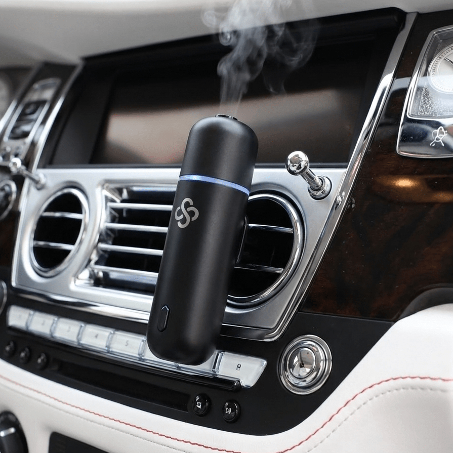 Scent Society Car Club Diffuser Oil attached to car vent clip emitting diffusing scent