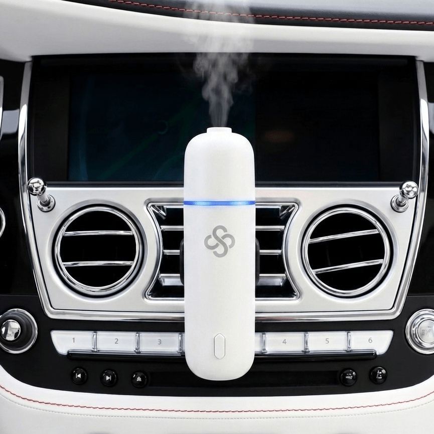 Scent Society Car Club Diffuser Oil attached to car vent clip emitting diffusing scent
