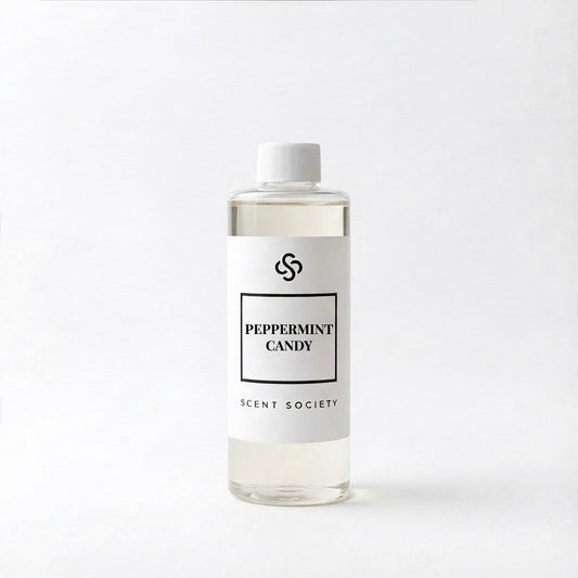 Scent Society's Peppermint Candy Diffuser oil in a clear bottle with white cap and label on a white background.