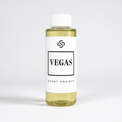 Scent Society Vegas fragrance diffuser oil , 100ml clear bottle with white label. Product image on neutral background.
