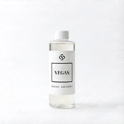Scent Society Vegas diffuser oil bottle with white cap and white label on white background